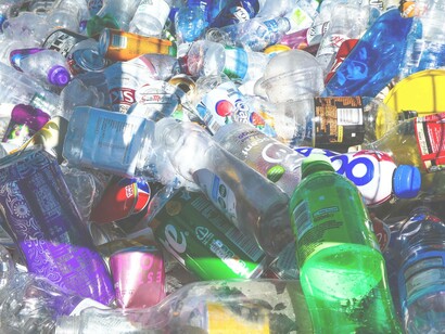 Tin cans and plastic bottles are all going to waste and not being recycled correctly which has a direct impact on climate change