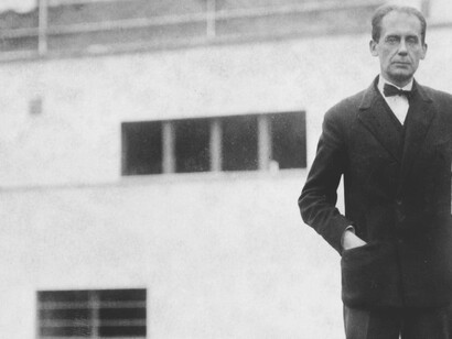 Walter Gropius, in front of a house designed by him, in 1927, photograph: ullstein bild via Getty Images
