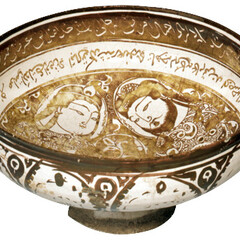 Drinking Bowl used for Wine, depicting a Couple, Unknown early 13th century Kashan/Iran fritware with tin glaze and lustre paint H 10,9 cm; Ø 20,5 cm