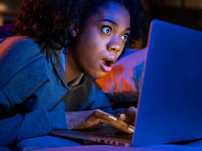 With an increasing number of free ad-supported streaming services, viewers can now enjoy their favourite shows and movies without the hefty subscription fees, just like this woman binge-watching her favourite series