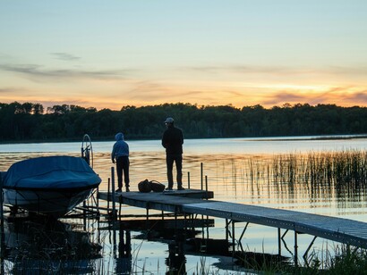 Sunset fishing on a quiet lake in Nisswa captures Minnesota’s Land of 10,000 Lakes spirit