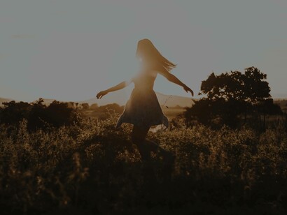 Dancing alone in an open field with no one around as the sun sets is an artistic way of trying to self-love