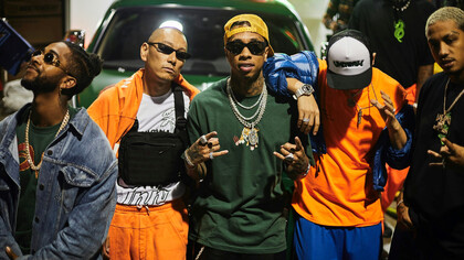 Tyga poses with talented dancers during the recording of his latest music video