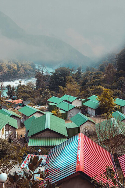Rishikesh, nestled in the Himalayan foothills of Uttarakhand, India, lies serenely beside the sacred Ganges River