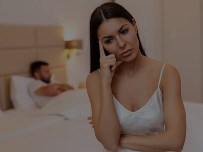 Home scene of a young couple facing relationship issues, with the woman showing signs of depression and frustration