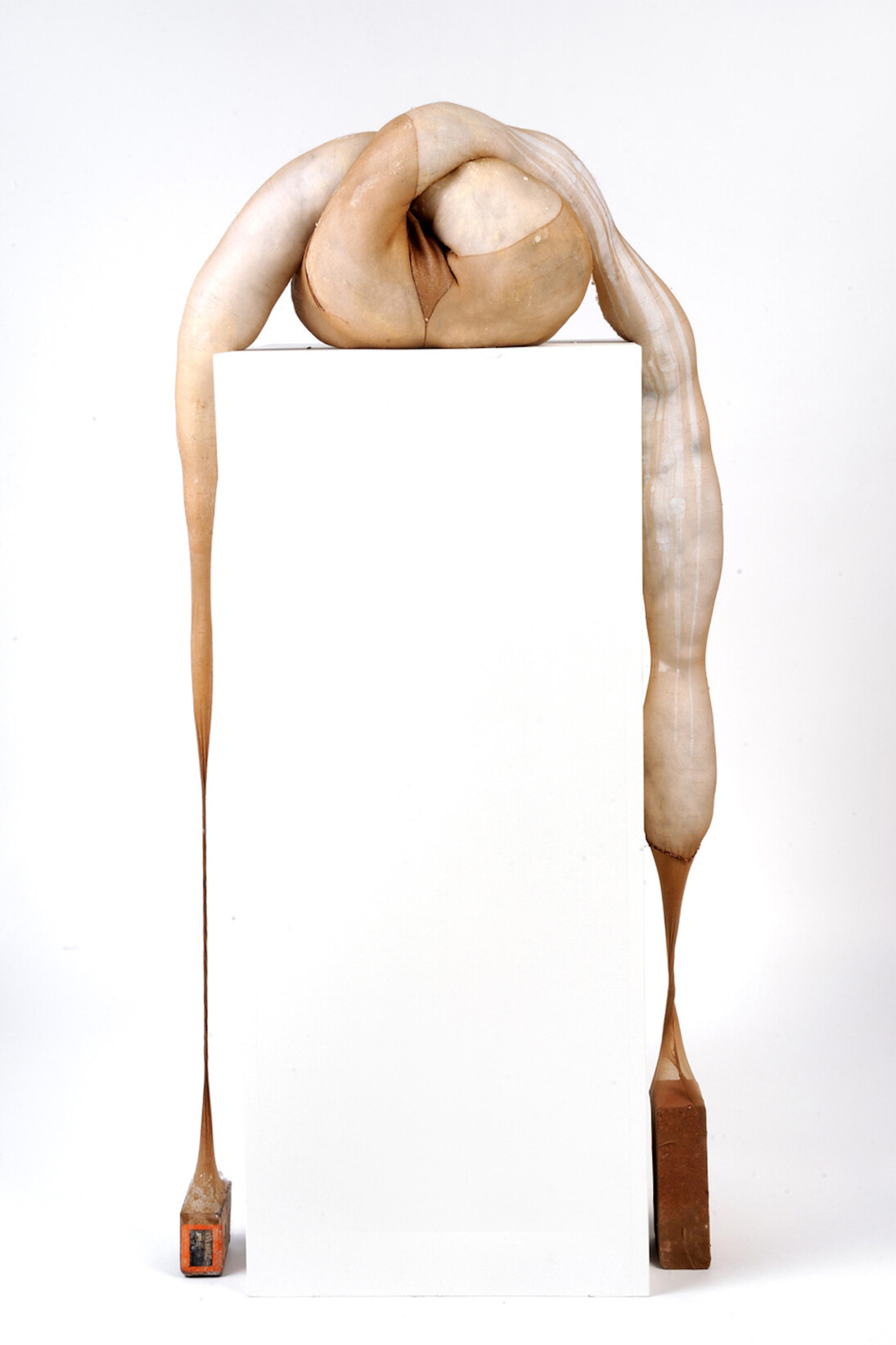 Victoria Dugger, Soft Machine 1, 2015, Encaustic, nylon, brick, 12 x 32 x 24 inches. Courtesy of Dedalus Foundation