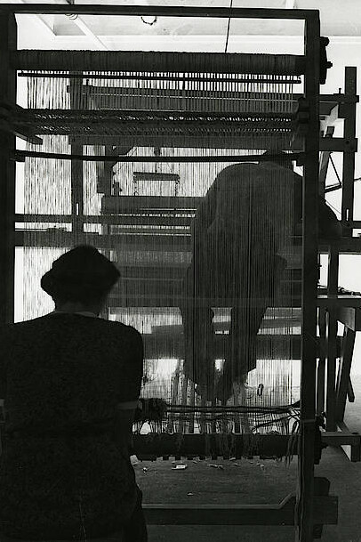 Two students weaving on a rug loom n.d. Photo by John Stix. Courtesy Western Regional Archives, State Archives of North Carolina, Asheville, NC.