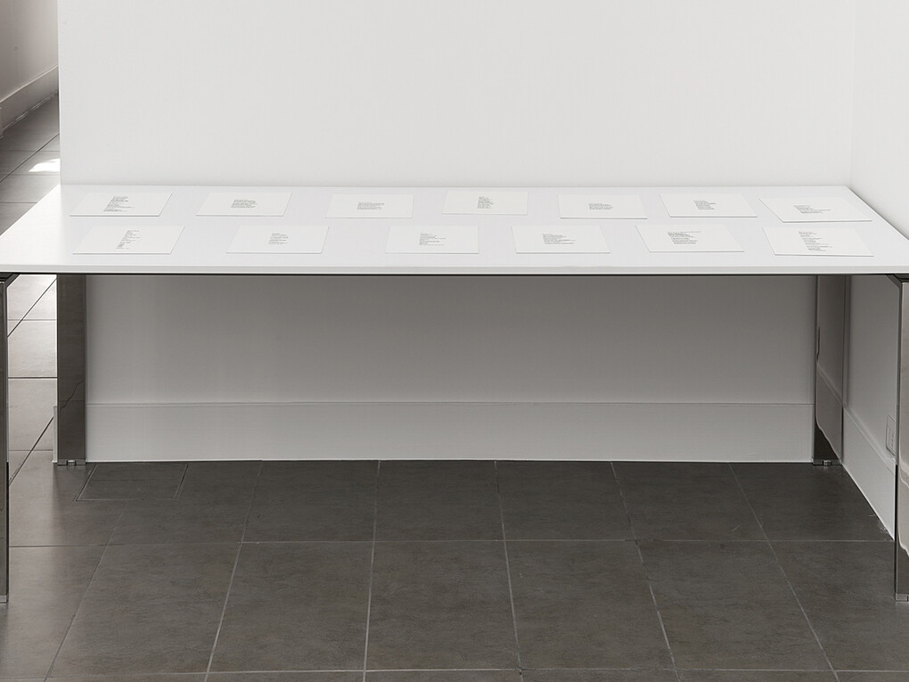 Keith J.Varadi, Reading, Writing, 2015, 13 Poems on office table, 80 x 200 x 73.5 cm (in. 31 1⁄2x78 3⁄4x28 7⁄8)