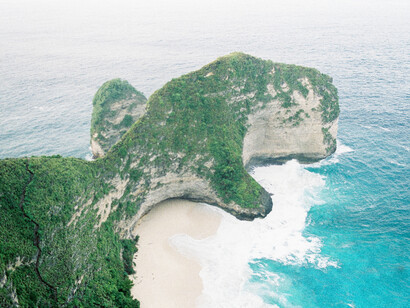 Untouched coastline of Nusa Penida, Indonesia and its green vast cliffs