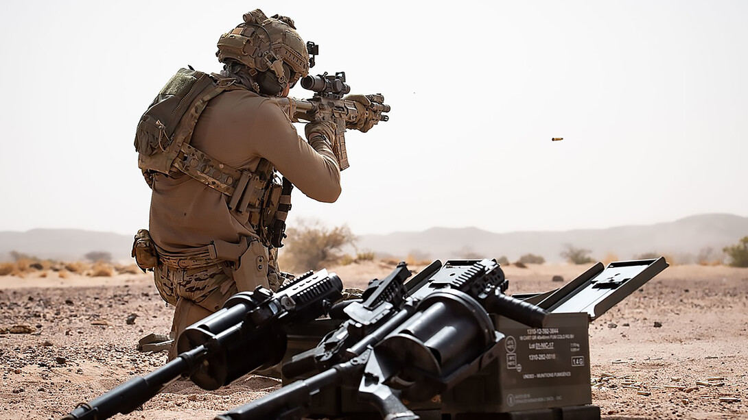 A French special forces operator from Task Force Takuba in the Sahel, with a Milkor Multiple Grenade Launcher visible in the foreground (2 June 2022)