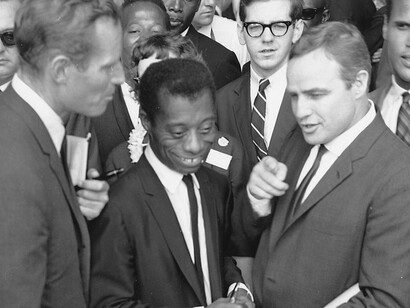 Civil Rights March on Washington, D.C. – Author James Baldwin with actors Marlon Brando, Charlton Heston, and Harry Belafonte, 08/28/1963