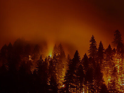 The evocative imagery of the Smokehouse Creek Fire, where the synergy of fire and smoke paints a dramatic picture across the Texas landscape during the evening, underscoring the critical importance of proactive measures to mitigate the impact of escalating wildfires