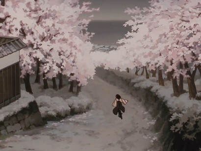 Chiyoko moving gracefully through a blossom-filled landscape in Millennium Actress (2001), representing how cinema changes memory into a living experience