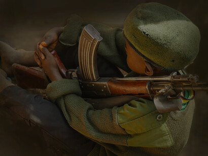 A child with a gun in Yambio, South Sudan