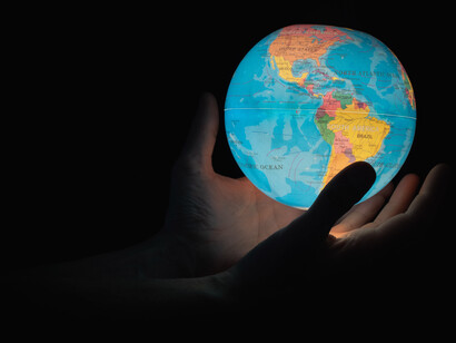 It takes two hands to care for the globe