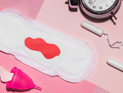 Period essentials from above: sanitary products, pain relief, and self-care items for managing menstruation