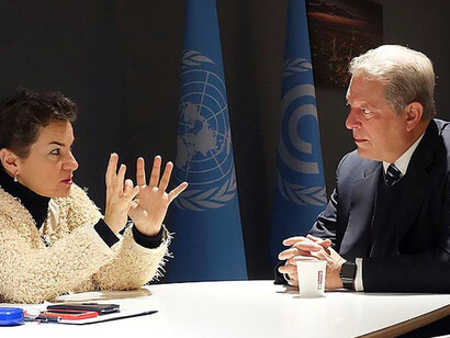 Christiana Figueres and Al Gore join forces in Bonn, Germany, on December 2, 2015, to strategize on climate action and global cooperation