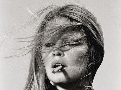 Terry O'Neill, Brigitte Bardot smoking cigar, 1971. Courtesy of The Selects Gallery