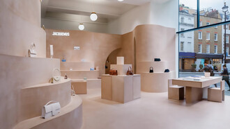 The entrance to the Jacquemus shop is a minimalist yet striking design, blending modern elegance with the brand's signature laid-back, Mediterranean aesthetic, London, UK