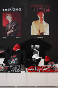 A stylish display of clothing and accessories inspired by K-pop collaborations—where Korean fashion meets global trends