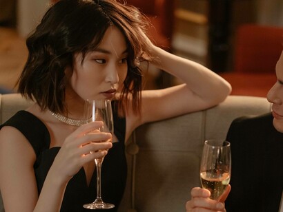 A woman not enjoying the turn of the conversation during a date
