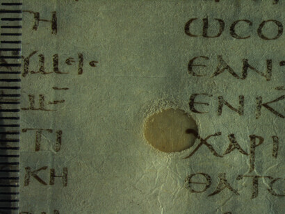 Codex Sinaiticus, details of scar tissue, Quire 85, Foloi 3 recto, New Testament volume, Image courtesy of the British Library