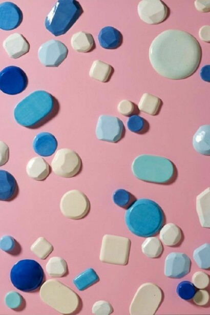 Untitled (pink), 2013. Automotive-finished wood panels with hand-glazed, high-fired ceramics. 60 x 48 inches
