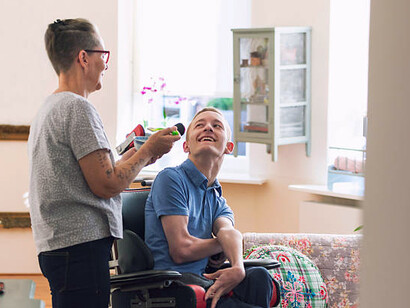 A mother supporting her son with ALS