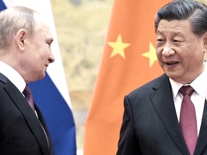 Vladimir Putin, presidente de la Federación Rusa, y Xi Jinping, presidente de la República Popular China