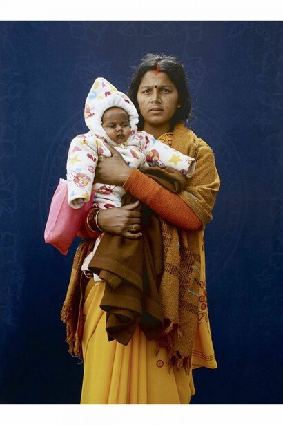 Kumbh Mela Pilgrim – Mamta Dubey And Infant, Giles Price, 2013 © Giles Price