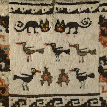 Nazca pre-Columbian feathered tunic, showcasing intricate craftsmanship and cultural significance
