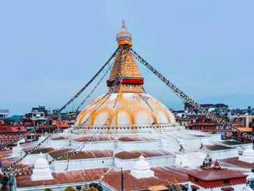 Nestled in the heart of Boudha, Kathmandu, Nepal, Buddhanath Stupa boasts a massive white dome and a gilded spire, offering a serene space for meditation and reflection amidst the city’s lively surroundings