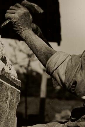 William Edmondson crafting a sculpture
