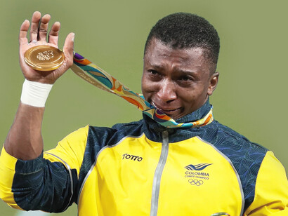 Óscar Figueroa, exlevantador de pesas colombiano que compite en la categoría de los 62 kilogramos