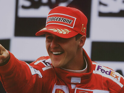 Michael Schumacher jubilantly celebrating his Formula 1 victory