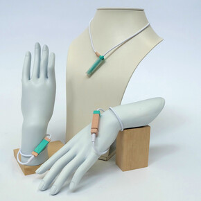 Neckace and bracelets are a wearable navigation system for people who are blind. Connected to a voice-controlled iPhone app and GPS, haptic vibrations not only guide the wearer, but are able to track obstacles above the knee.
