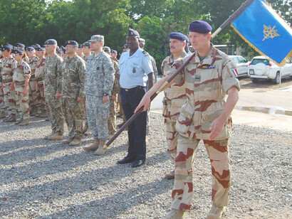 French and Chadian forces take part in a flag ceremony marking the launch of Operation Barkhane, the anti-terrorist mission in Africa’s Sahel region that began in July 2014