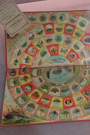 Round the World with Nellie Bly è un gioco da tavolo pubblicato nel 1890 da McLoughlin Bros., New York, per celebrare la circumnavigazione del globo di Nellie Bly a tempo di record, tra il 14 novembre 1889 e il 25 gennaio 1890