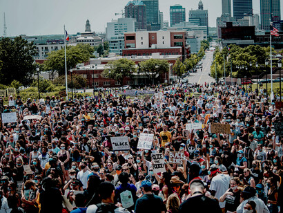 A large crowd gathers in downtown Des Moines during a Black Lives Matter protest, calling for racial equality, social justice, and an end to systemic discrimination