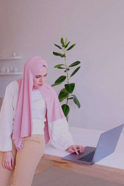 Deep in thought, she navigates the world of technology, reflecting on how Apple has transformed our everyday experiences through innovation