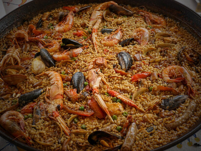The vibrant flavors of Spanish cuisine with our tantalizing dish of succulent cooked shrimps served alongside fragrant rice, a delightful fusion of Mediterranean ingredients