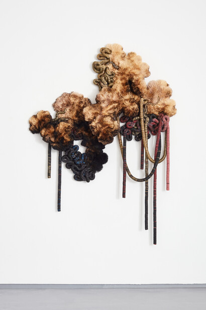 Chris Soal, Reverie, 2023, discarded beer bootle caps threaded onto electic fencing cable, held in polyurethane sealant 
on board, with burnt polyurethane sealant on board, 198x118x14 cm. Courtesy the artist and Piero Atchugarry Gallery