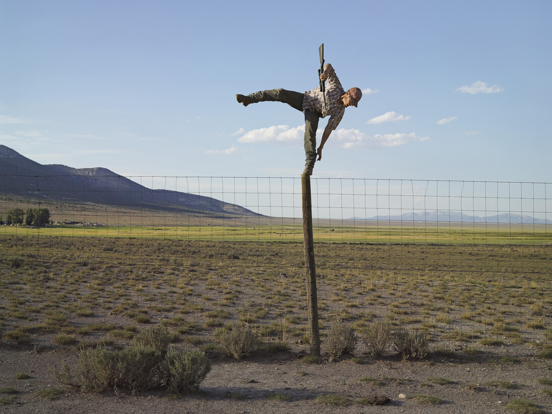 Lucas Foglia, Tommy Trying to Shoot Coyotes, Big Springs Ranch, Oasis, Nevada 2012, digital c-print on Fuji Crystal Archive paper mounted on Dibond. Courtesy of Robischon Gallery