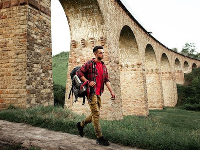 A young traveler exploring Europe with a backpack
