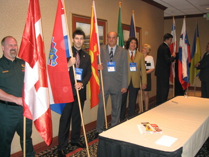 Croatian representatives participate in an IALEA Conference for the first time, R. Kopal carries the Croatian flag (second from the left) (Sacramento, CA, 2004)