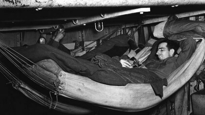 A soldier, reading and having a rest during the Second World War