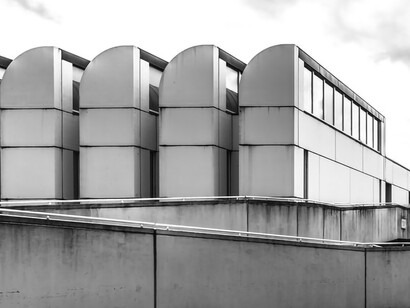 The Bauhaus Archive, built in 1979 in Berlin, Germany, adhering to the original plans conceived by Walter Gropius and brought to life by architects Alex Cvijanovic and Hans Bandel