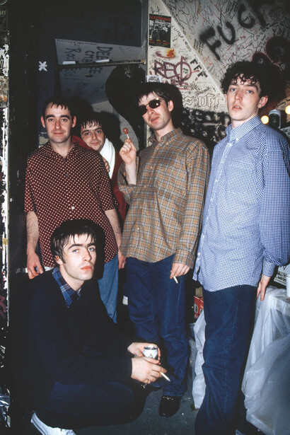 Dennis Morris, Original Oasis lineup, Japan, 1994. Courtesy of The Photographers' Gallery