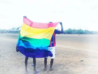 Members of the LGBTQ+ community within the Kakuma refugee camp are carrying their flag proudly