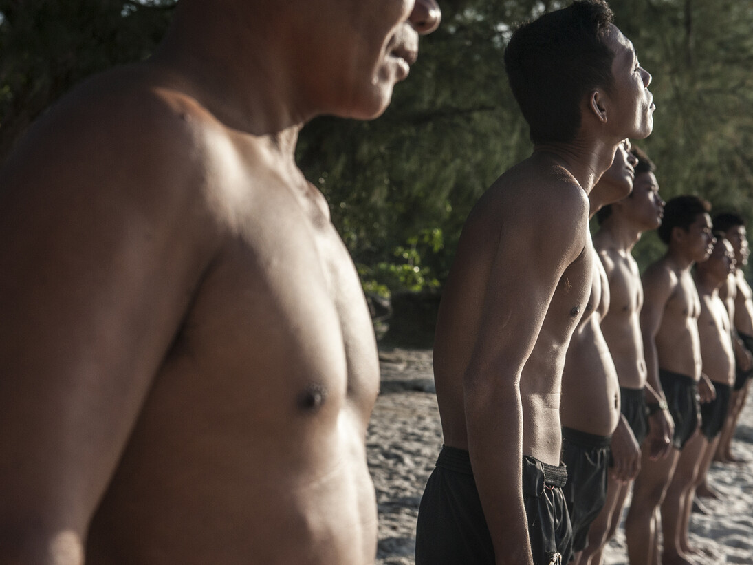 The UXO salvage diver team during training on the island of Koh
Rong off the coast of Sihanoukville, Cambodia, line up ahead of a
sea swim. All the divers were previously de-miners with the
Cambodian Mine Action Centre and were selected by the Golden
West Humanitarian Foundation from a group of over forty
applicants